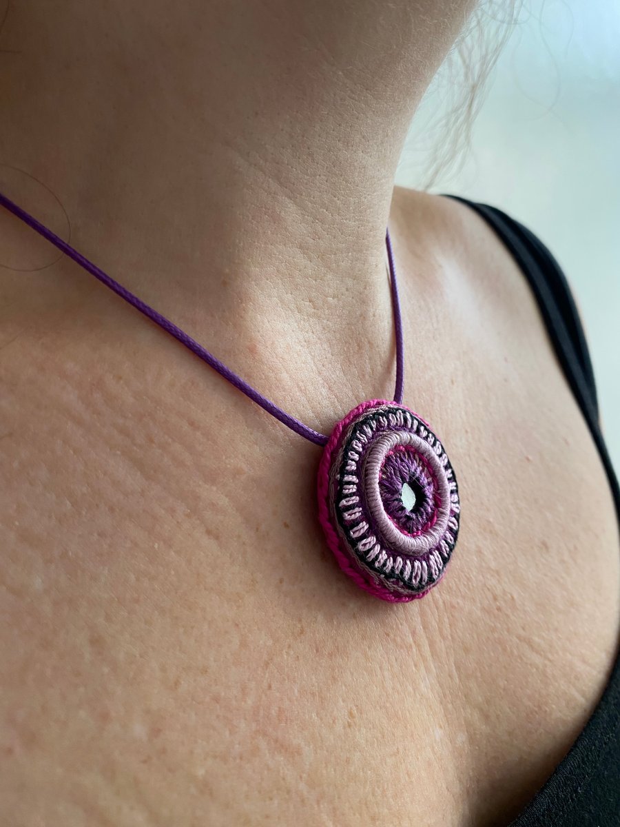 Pendant, shades of purple hand embroidered abstract design