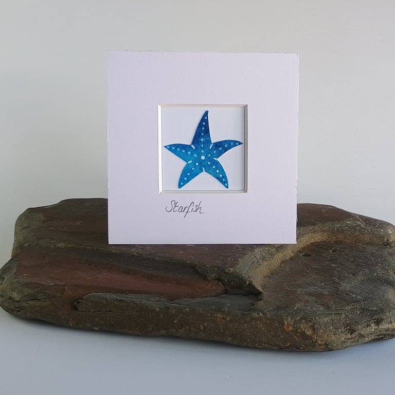 A blue batik 'Starfish' fabric picture - 4x4 inches including mount