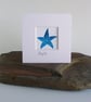 A blue batik 'Starfish' fabric picture - 4x4 inches including mount