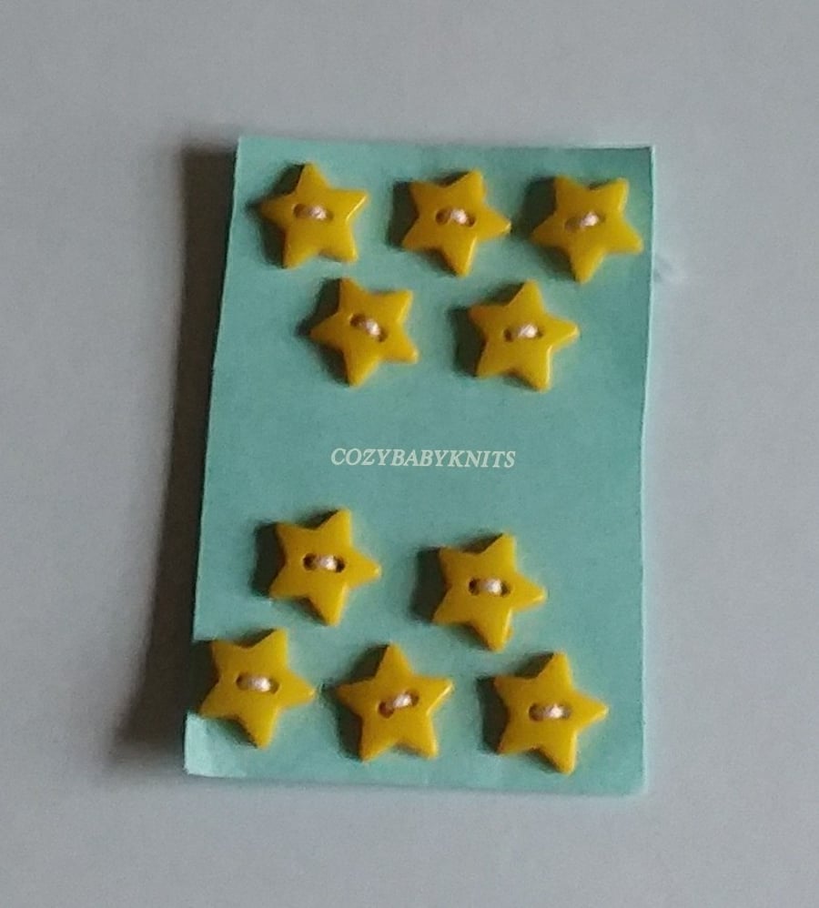 Mustard yellow star plastic buttons