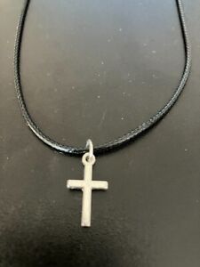cross charm pendant on a 18" leather cord necklace