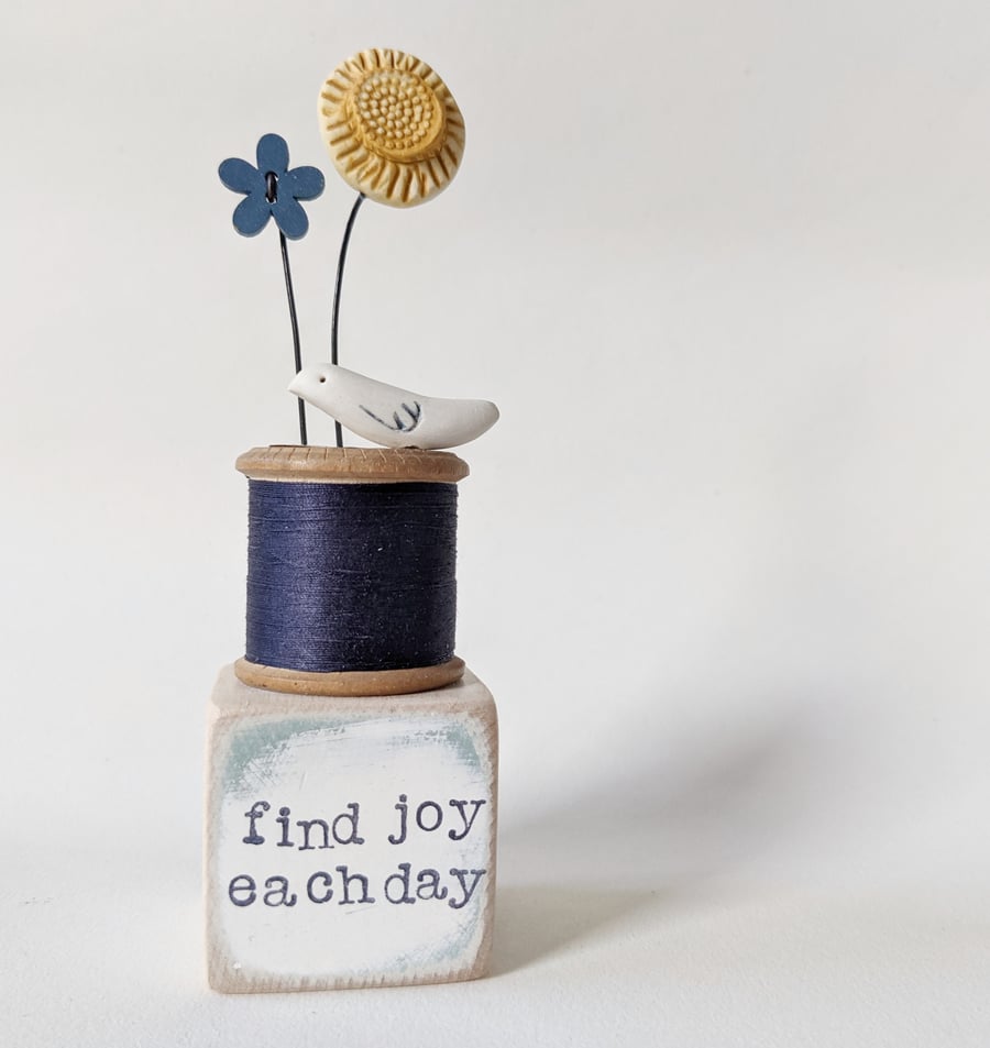 Clay Flower and Bird on a Vintage Bobbin 'find joy'