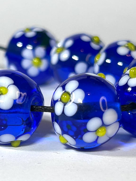 Handmade blue and white daisy patterned lamp work glass beads