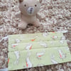 Child face covering – pale green rabbit print material