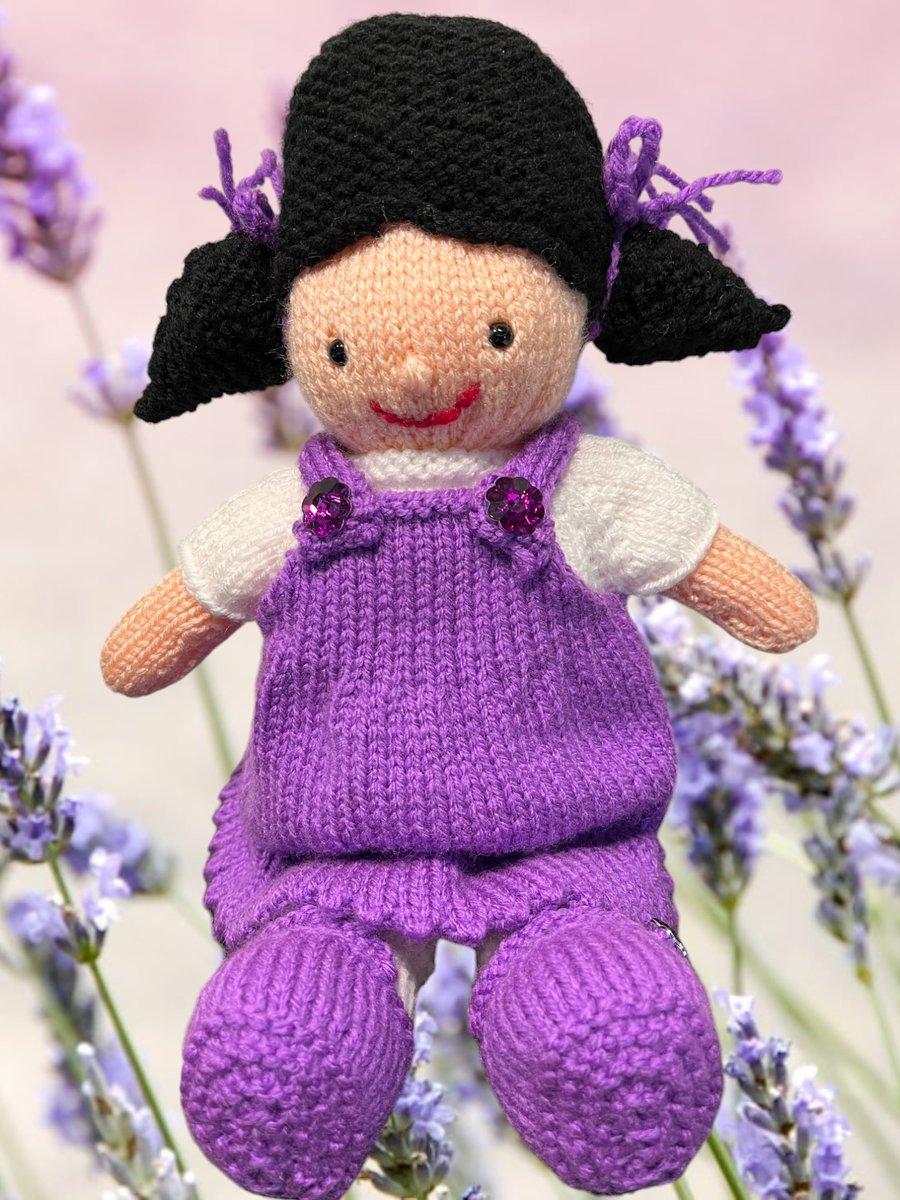 Hand knitted doll