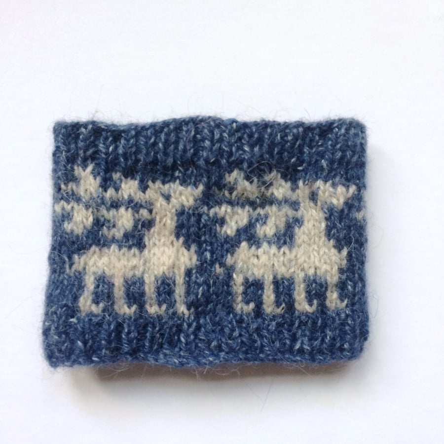 Blue Reindeer hand knit mug cosy