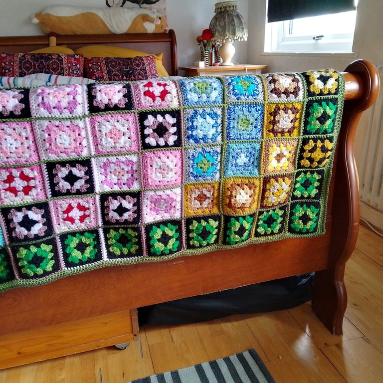 vintage style crochet throw handmade in a multicoloured granny square design.