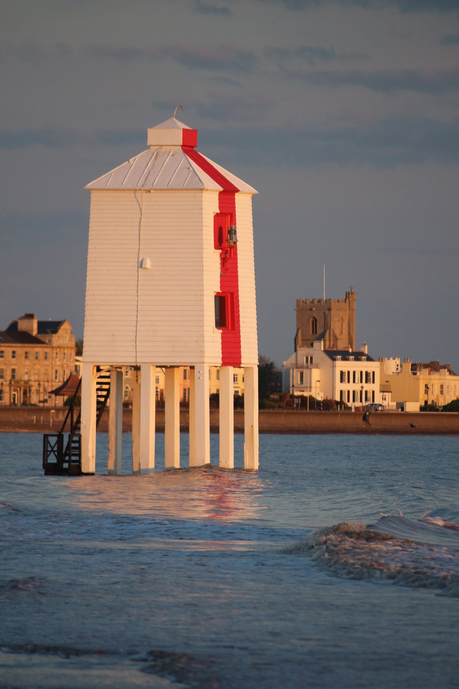 Photographic greetings card of Burnham-on-Sea Low Lighthouse, with town behind.