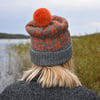 Hand knit wool bobble hat. Grey winter fairisle pom pom beanie hat