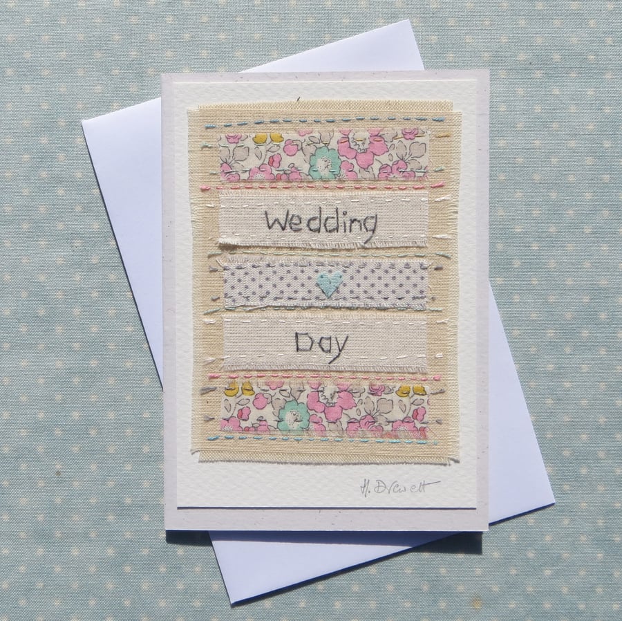 Hand-stitched, pretty little card with applique hearts and Liberty fabric
