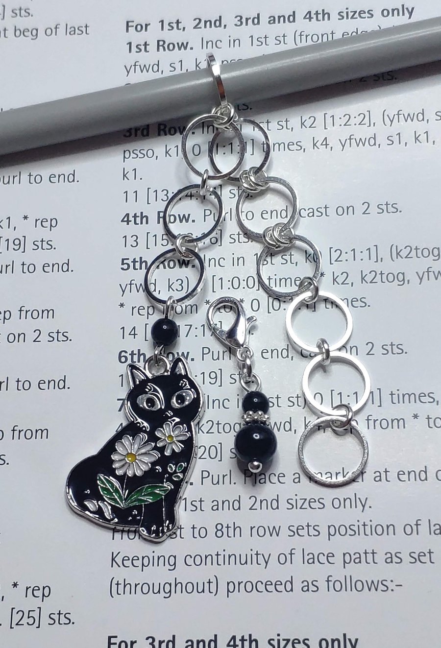 Black and silver cat row counter for knitting