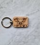 Wooden hand burned cute pig keyring