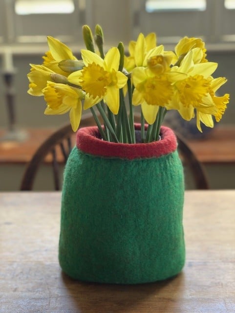 Green felted  vase.