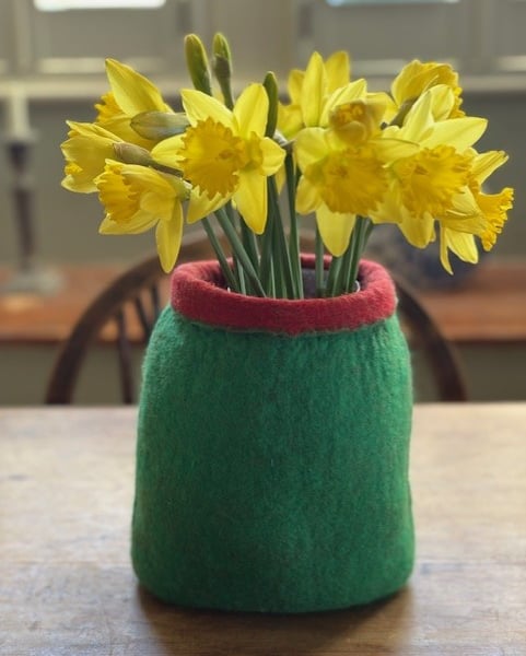 Green felted  vase.