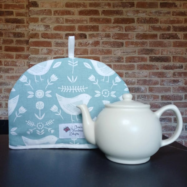 Tea Cosy in Seafoam coloured Narvik Birds Fabric