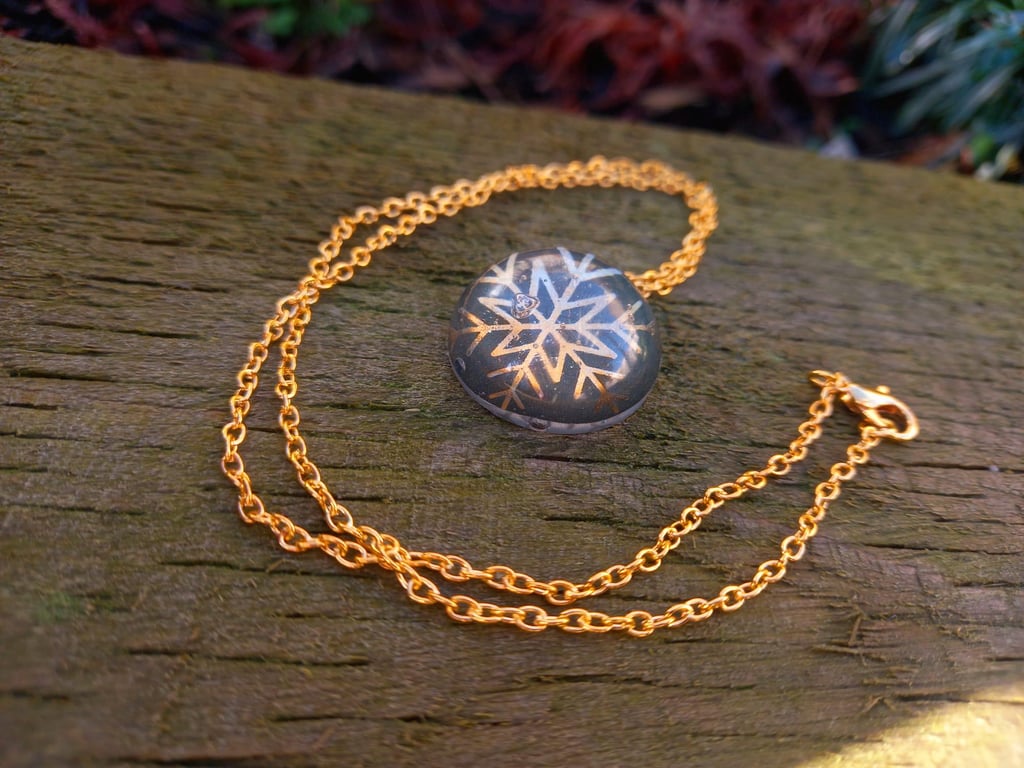 Golden Snowflake Globe Necklace
