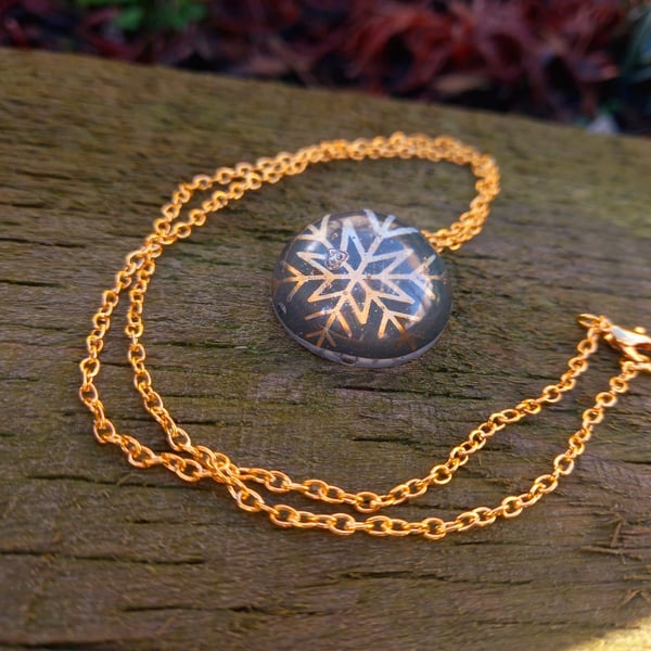 Golden Snowflake Globe Necklace