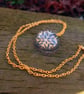 Golden Snowflake Globe Necklace
