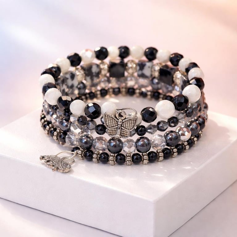 Black White Beaded Stack Bracelet Butterfly Elephant Charms