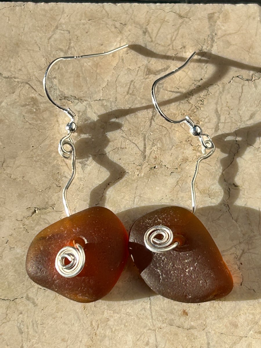 seaglass brown dangly earrings whirly silver