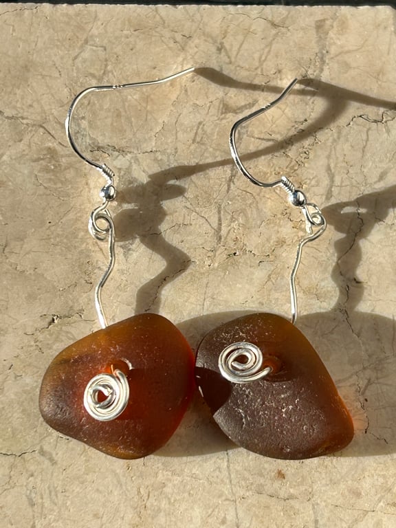 seaglass brown dangly earrings whirly silver