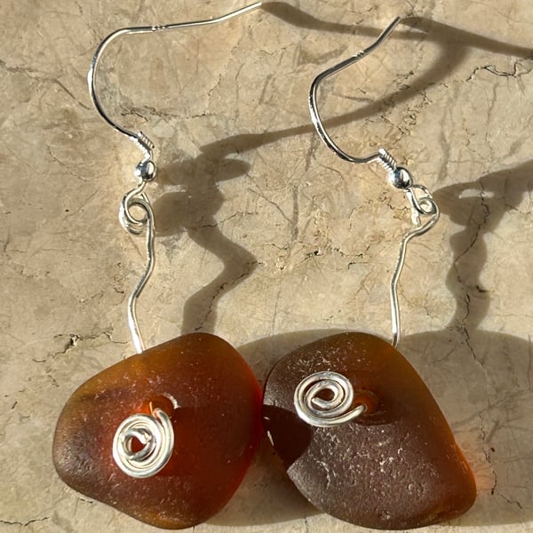 seaglass brown dangly earrings whirly silver