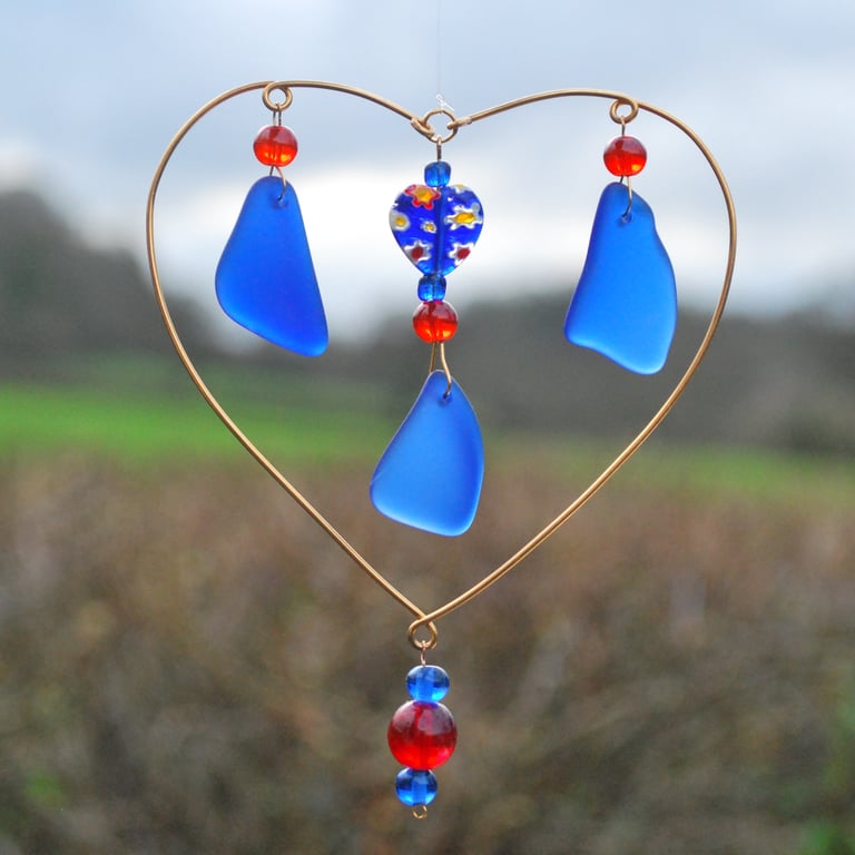 Blue glass sun catcher with heart
