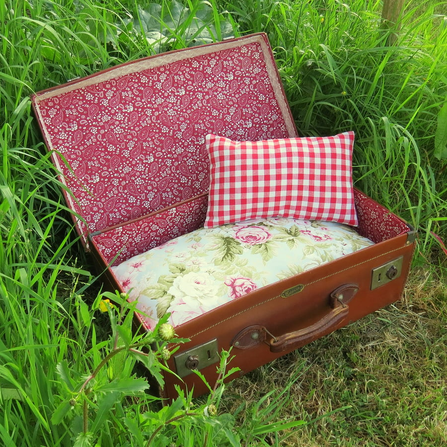 A quirky pet bed.  Made from a vintage 1940s suitcase.  Cat bed.  Dog bed.