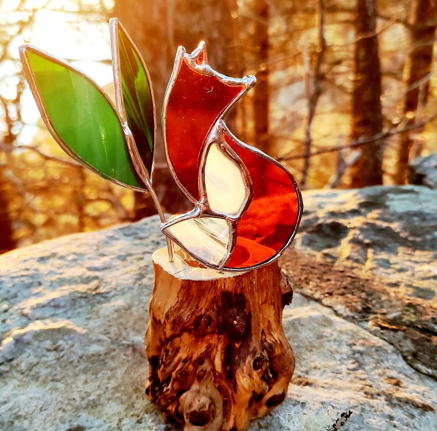 Hand made stained glass fox on a light up tree stump