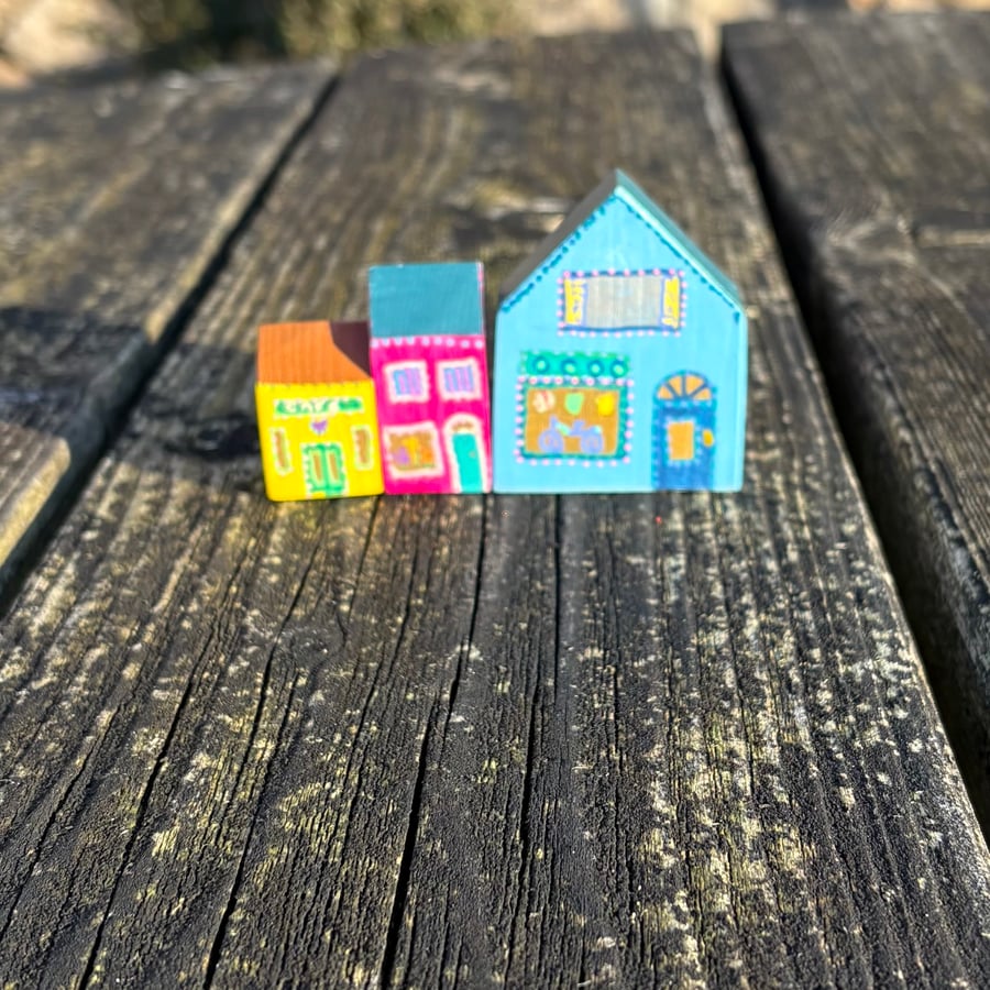 Parade of three little hand painted wooden shops - shelf ornaments