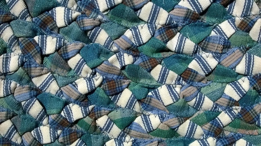 Handmade braided oval rug