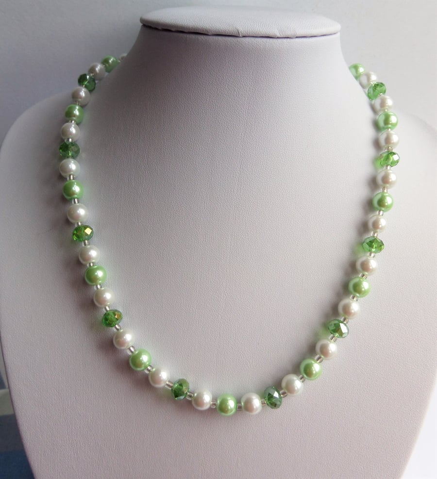 Green rondelle and light green and white glass pearl bead necklace. 