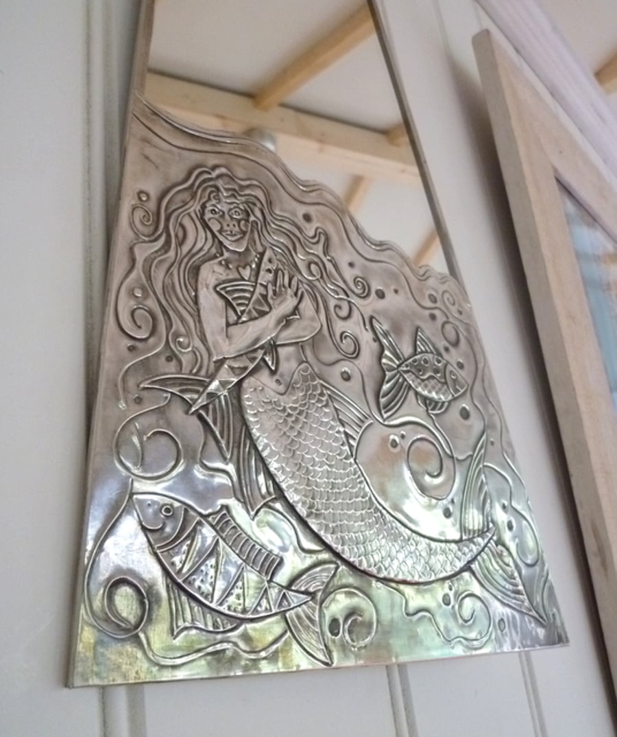 Mermaid bathroom mirror.