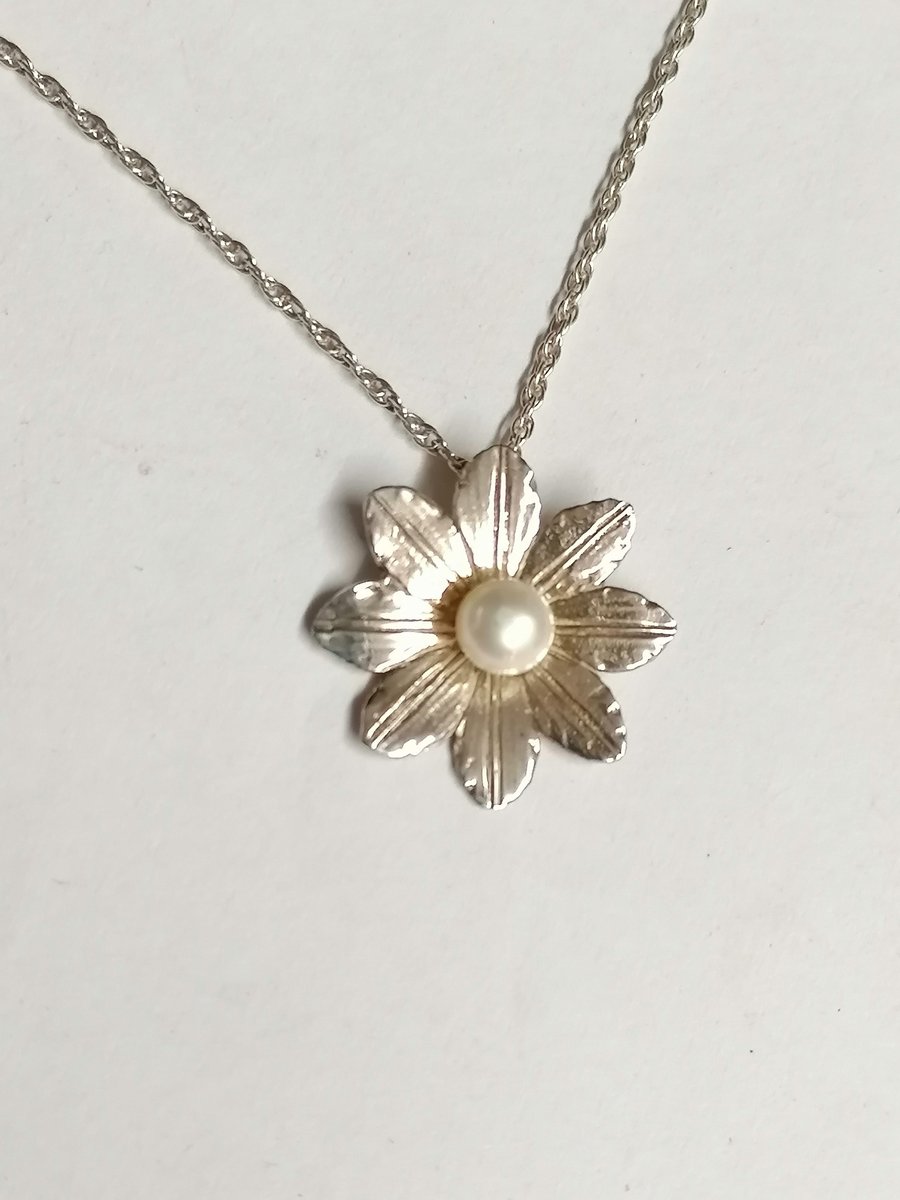 Clematis pendant set with a Freshwater pearl and made from Sterling Silver