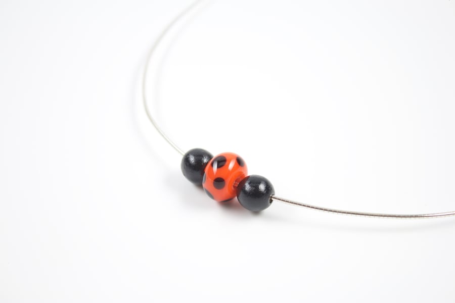 Handmade Lampwork Glass Focal Bead and Wooden Beads on a Sterling Silver Necklet
