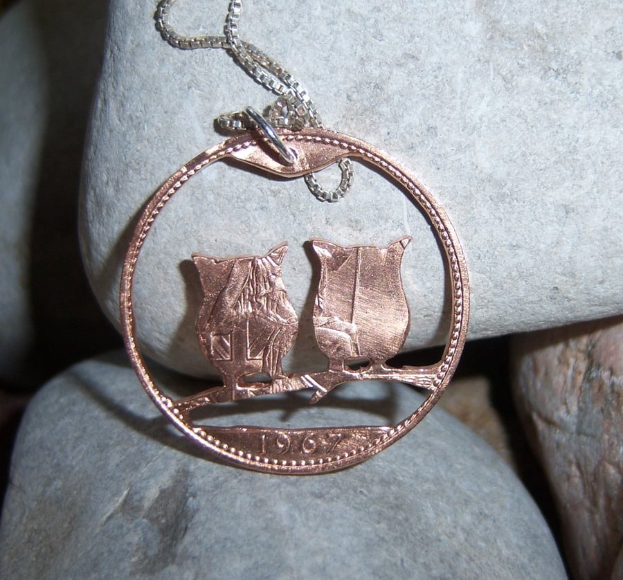 Owl pendant hand pierced from a penny coin