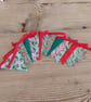 Handmade Christmas mini bunting in a red green colourway. - Image 1