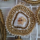 Sea Blossom – Seaglass Amulet with Dried Flower, Beads and Soutache