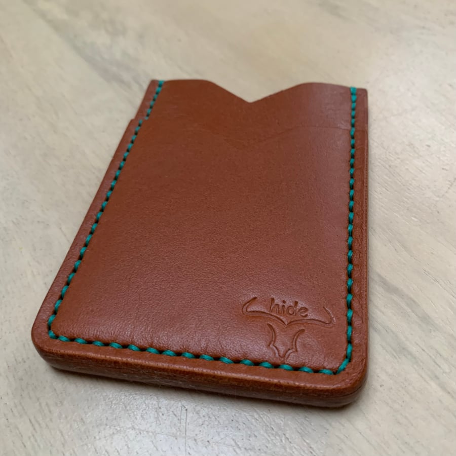Leather card holder wallet in tan with three slots 