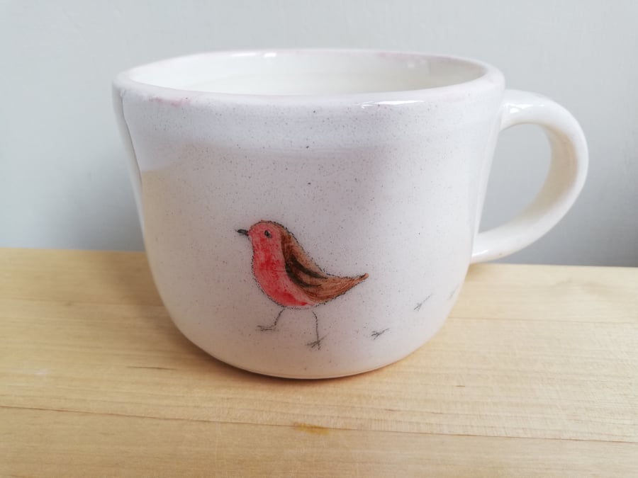 Hand thrown ceramic robin mug with painted Christmas bird gardeners gift
