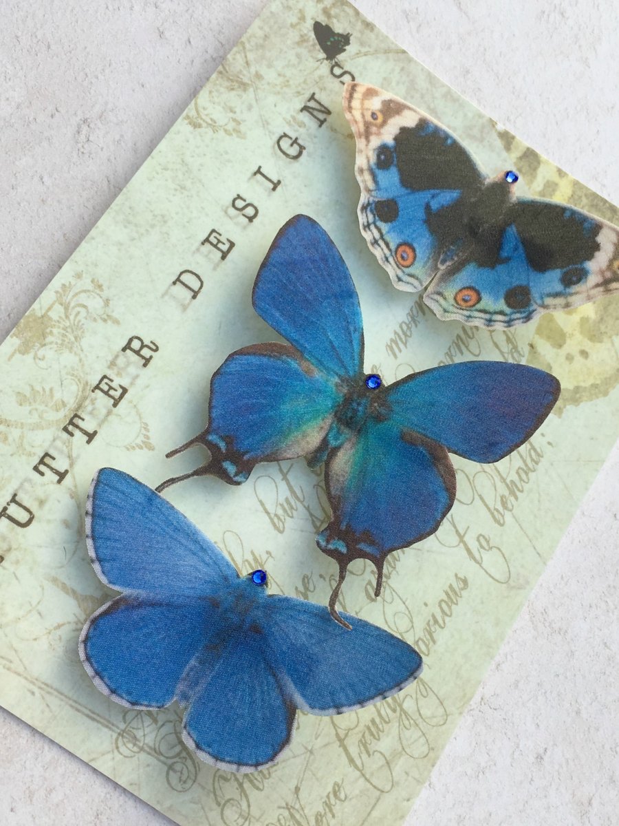 Trio of gorgeous blue silk butterfly hair clips with Swarovski Crystals.
