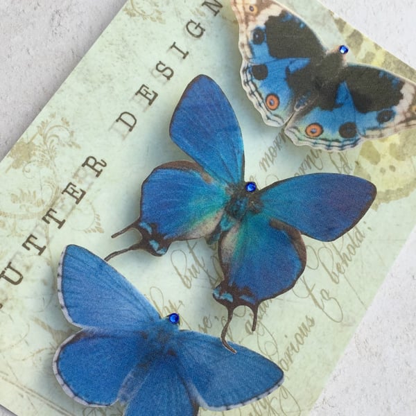 Trio of gorgeous blue silk butterfly hair clips with Swarovski Crystals.