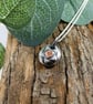 Sterling Silver Pebble Necklace with Star and Copper Heart - Image 1