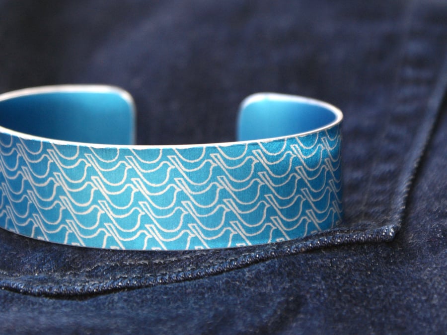 Blue bird print aluminium cuff