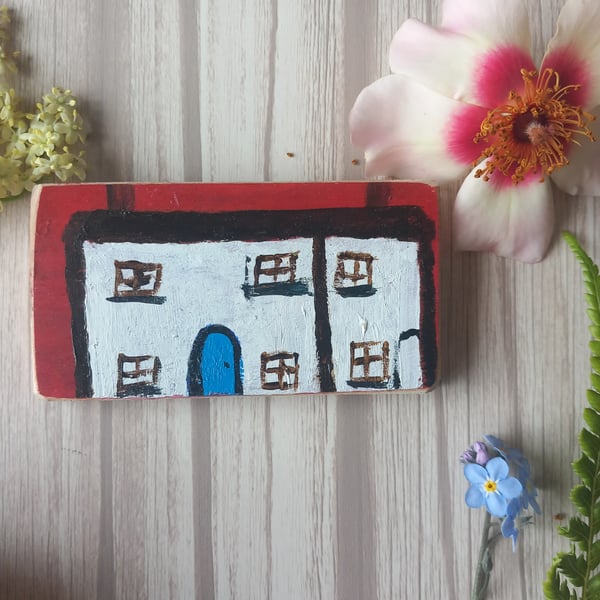 Miniature naive painting on reclaimed wood. 'Cottage with blue door'
