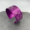 Anodised aluminium ginkgo leaf cuff in dark pink