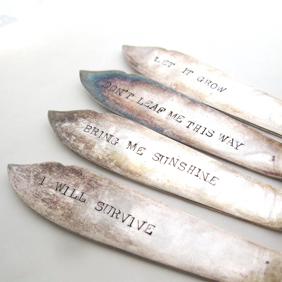 Four plant labels, song lyric puns, upcycled fish knives