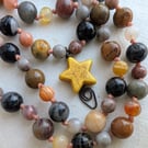 Jasper knotted cord necklace in earthy colours with yellow howlite star