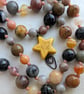 Jasper knotted cord necklace in earthy colours with yellow howlite star