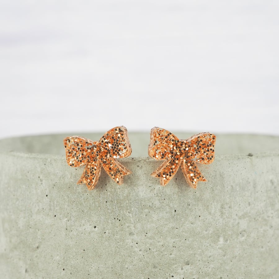 Titanium posts, Gold glitter bow studs